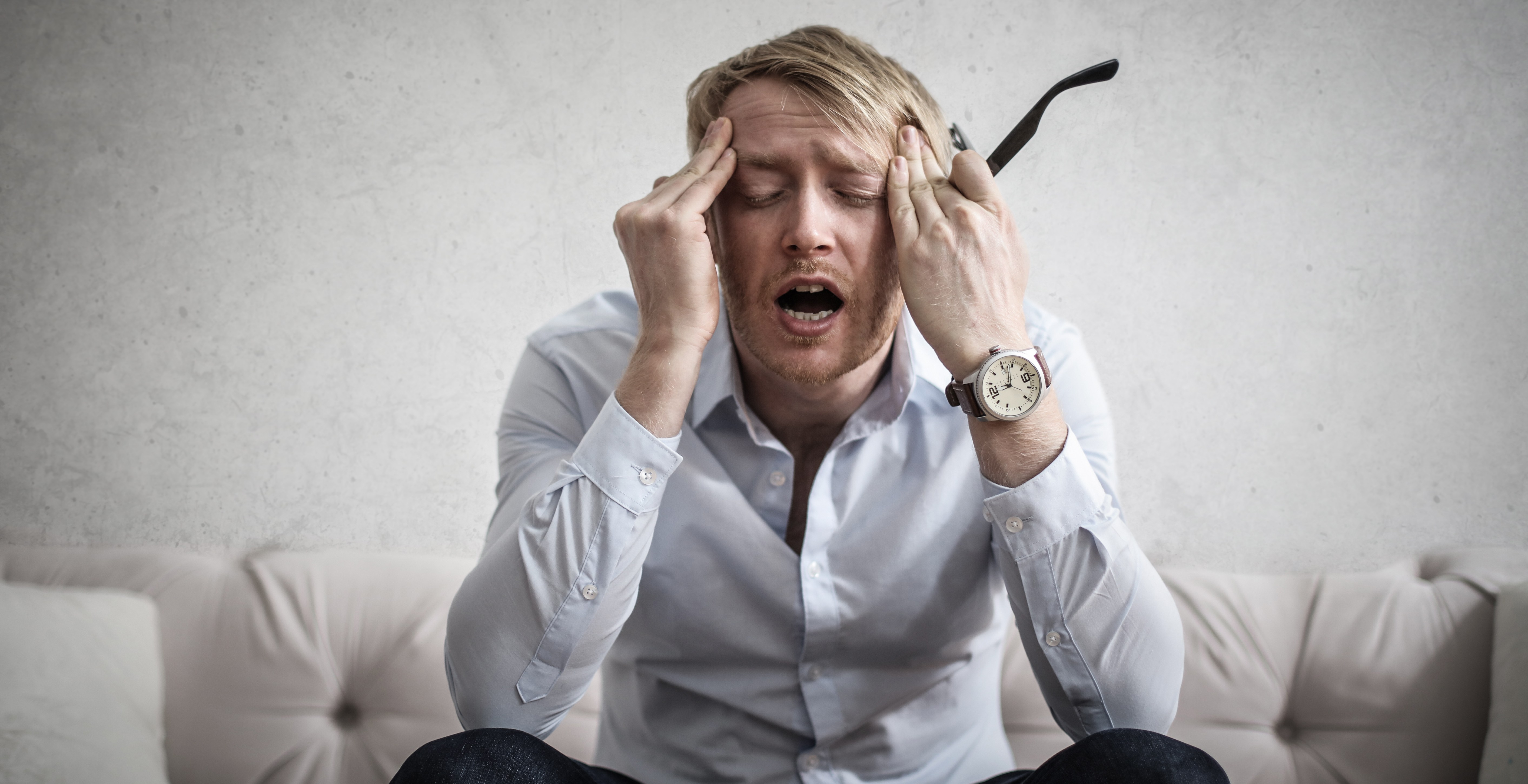 Canva - Photo Of Man Touching His Head