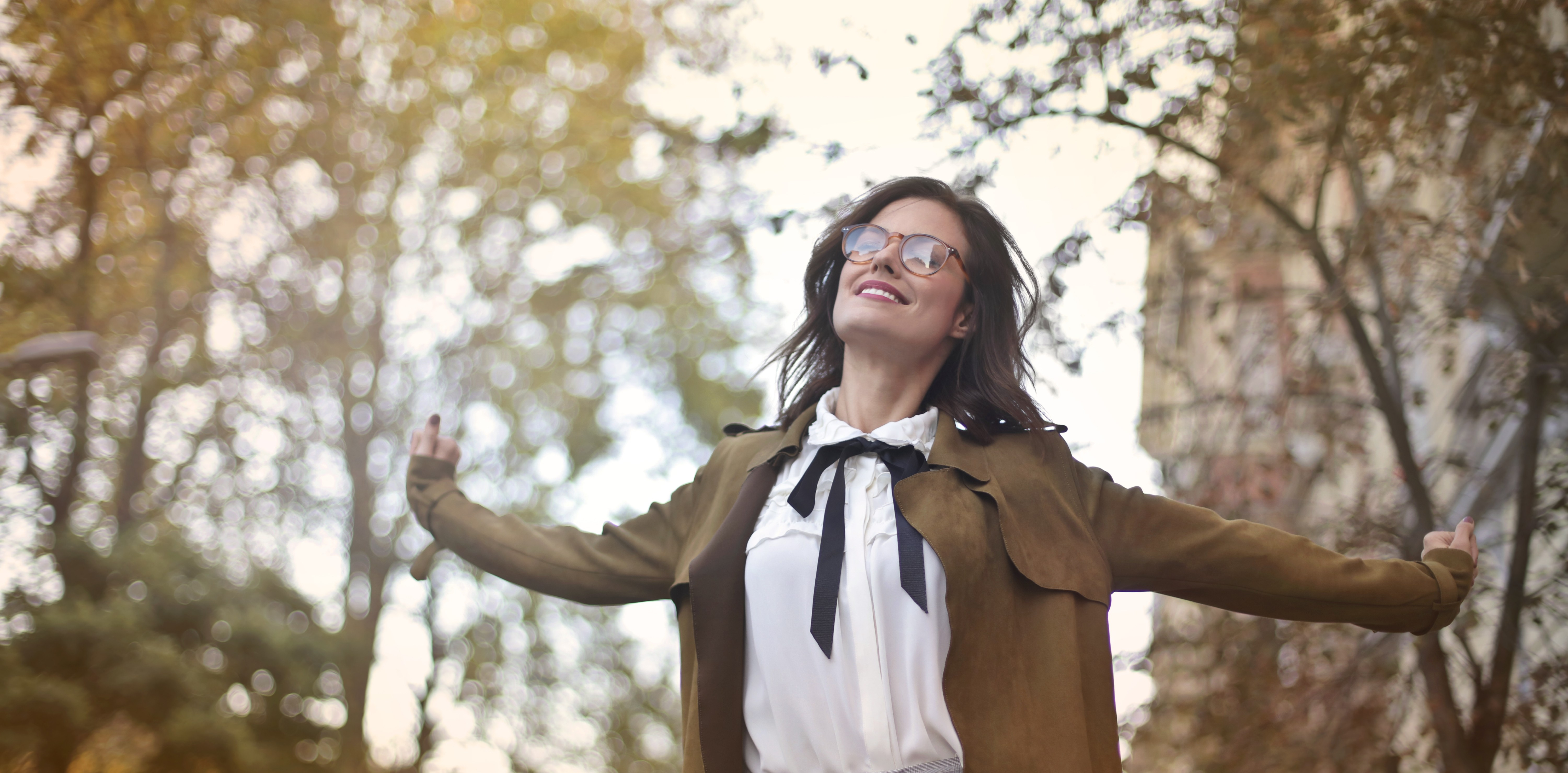 Canva - Content woman in retro clothes on bicycle in street