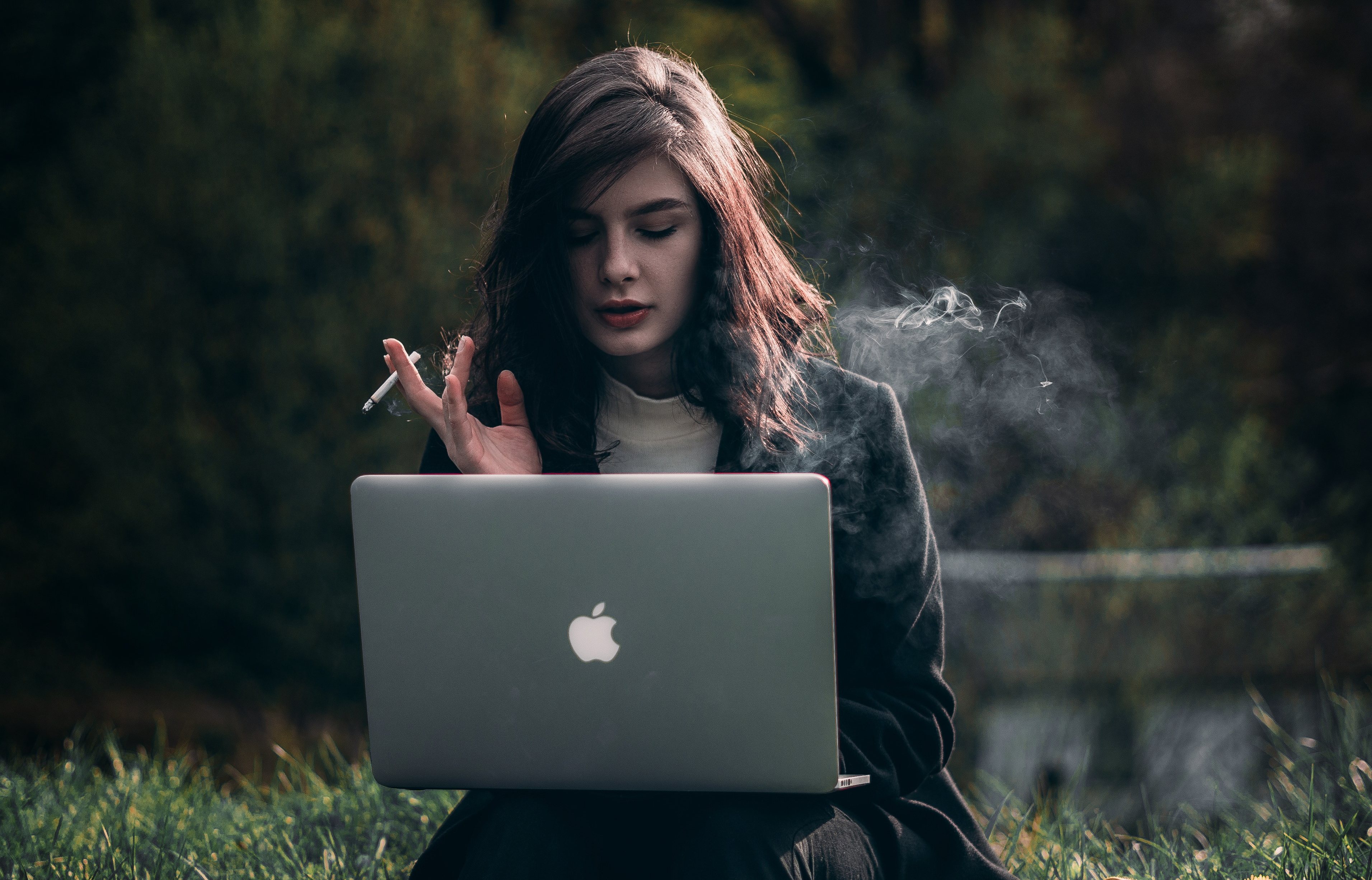 Canva - Photo of Woman Smoking Cigarette