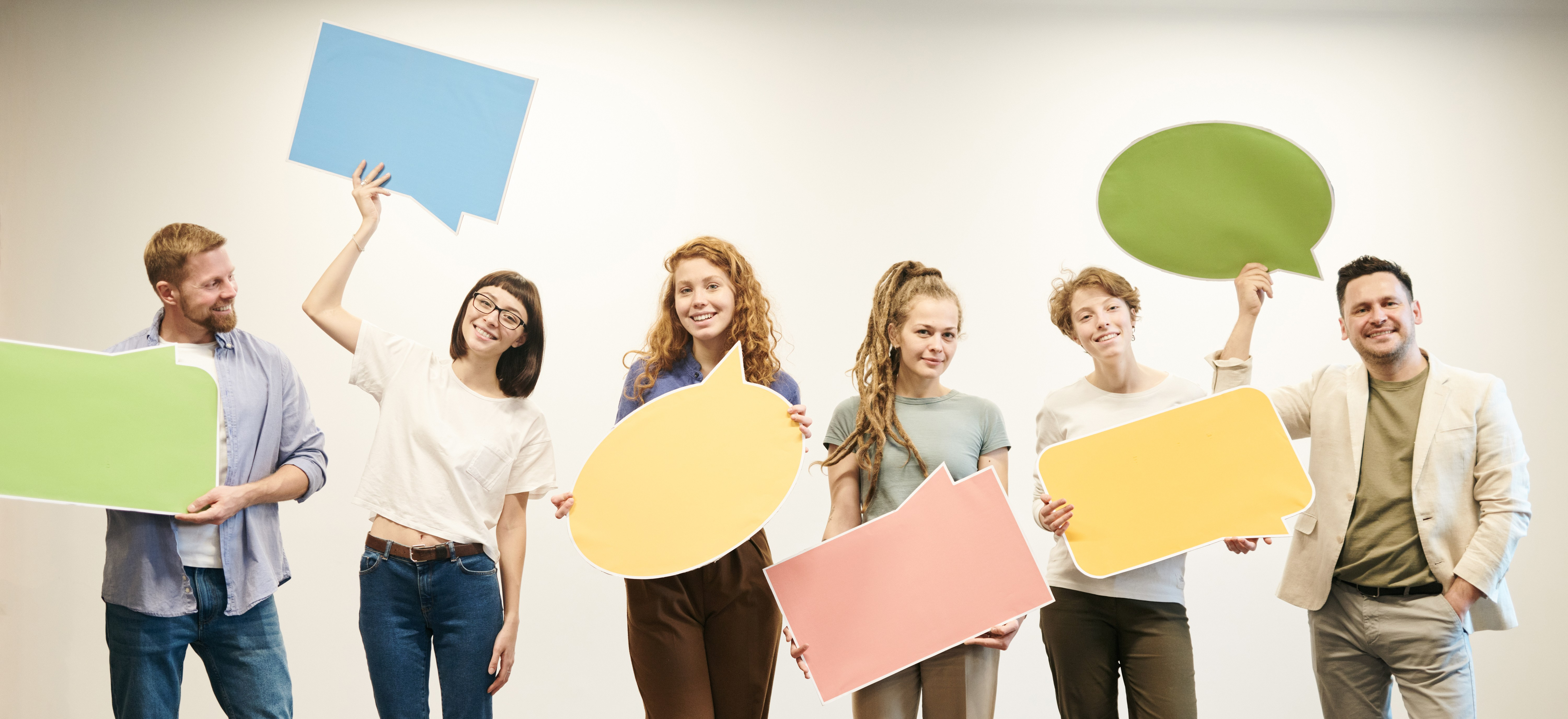 Canva - People Standing Near White Wall