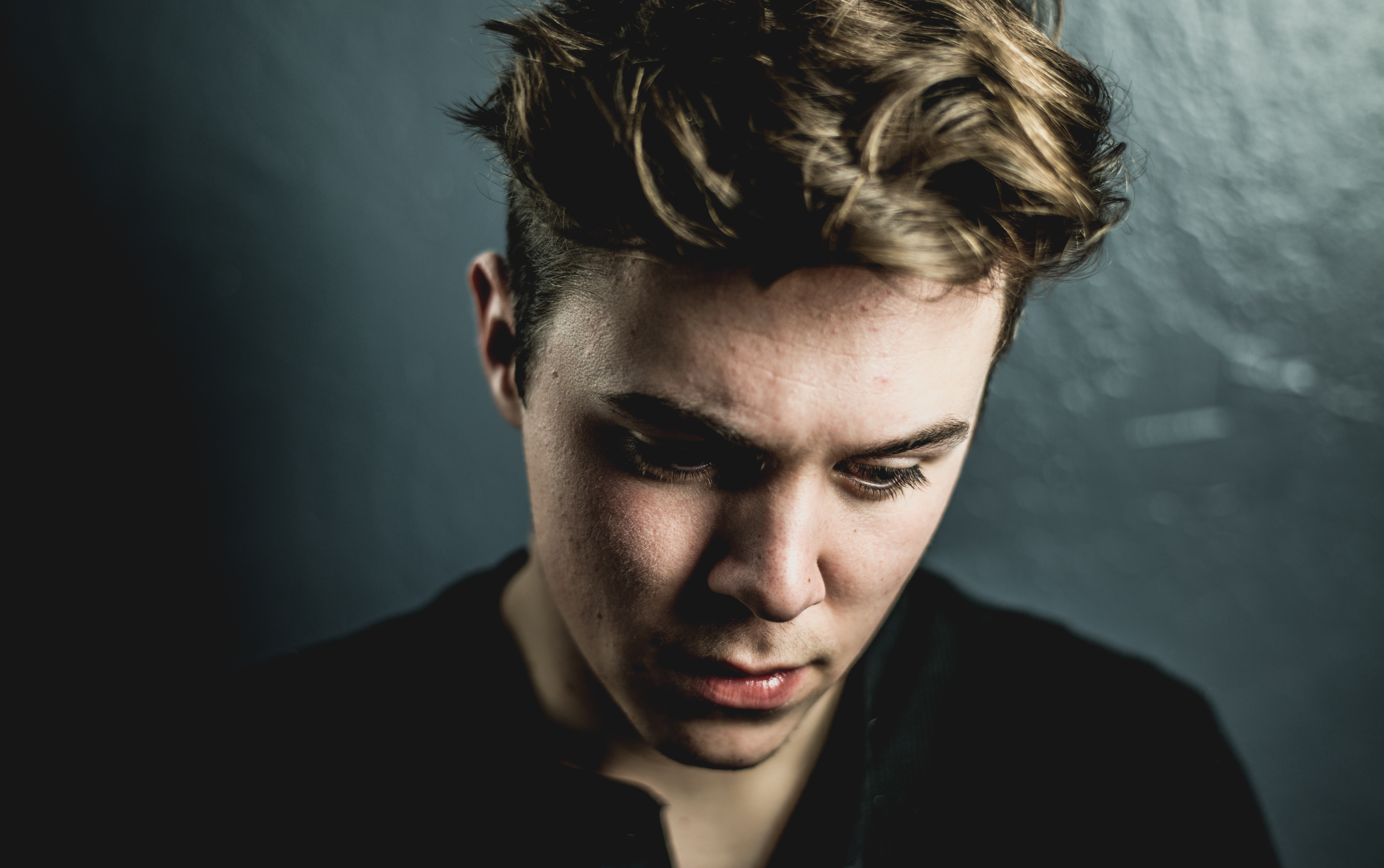 Canva - Man Looking Downward