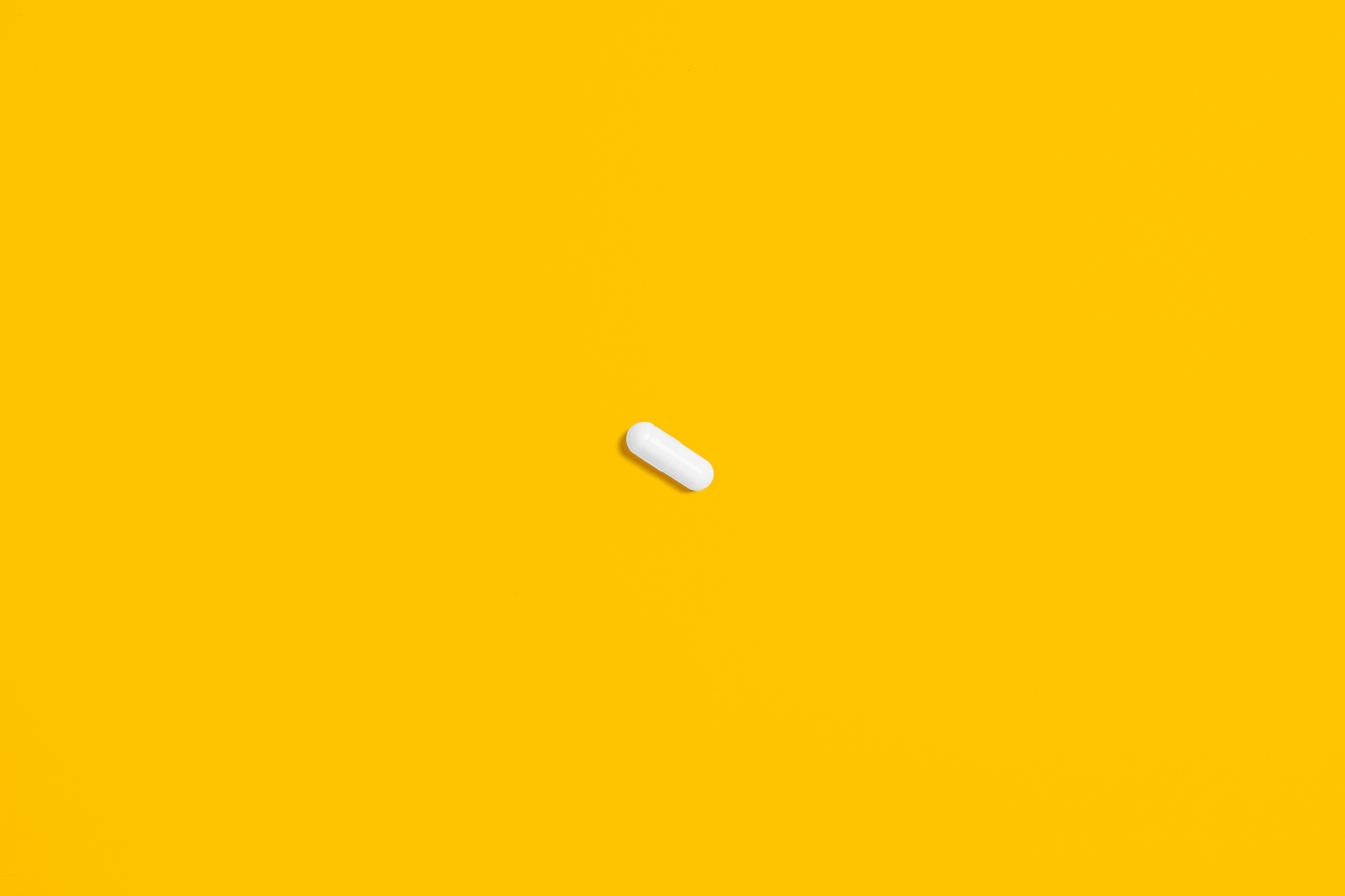 Canva - White Oval on Yellow Surface
