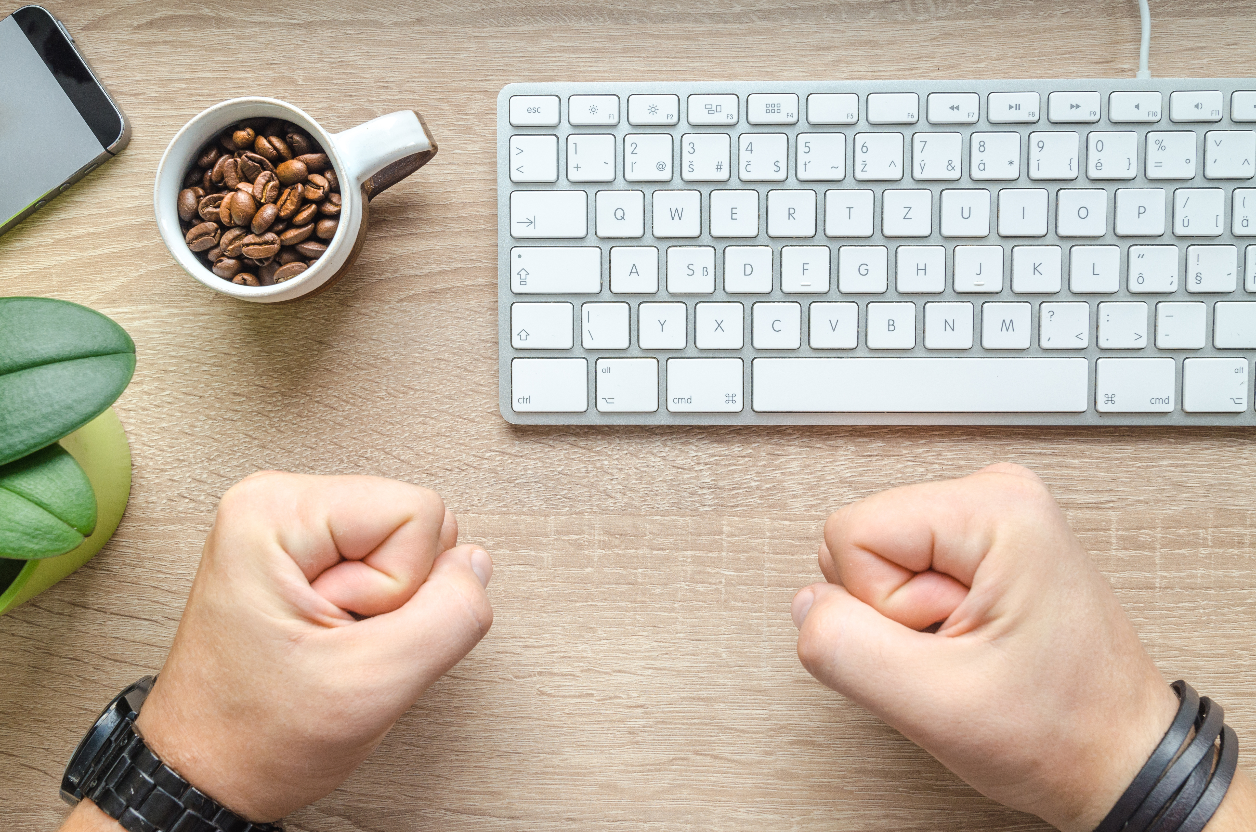 Man writing on the keyboard