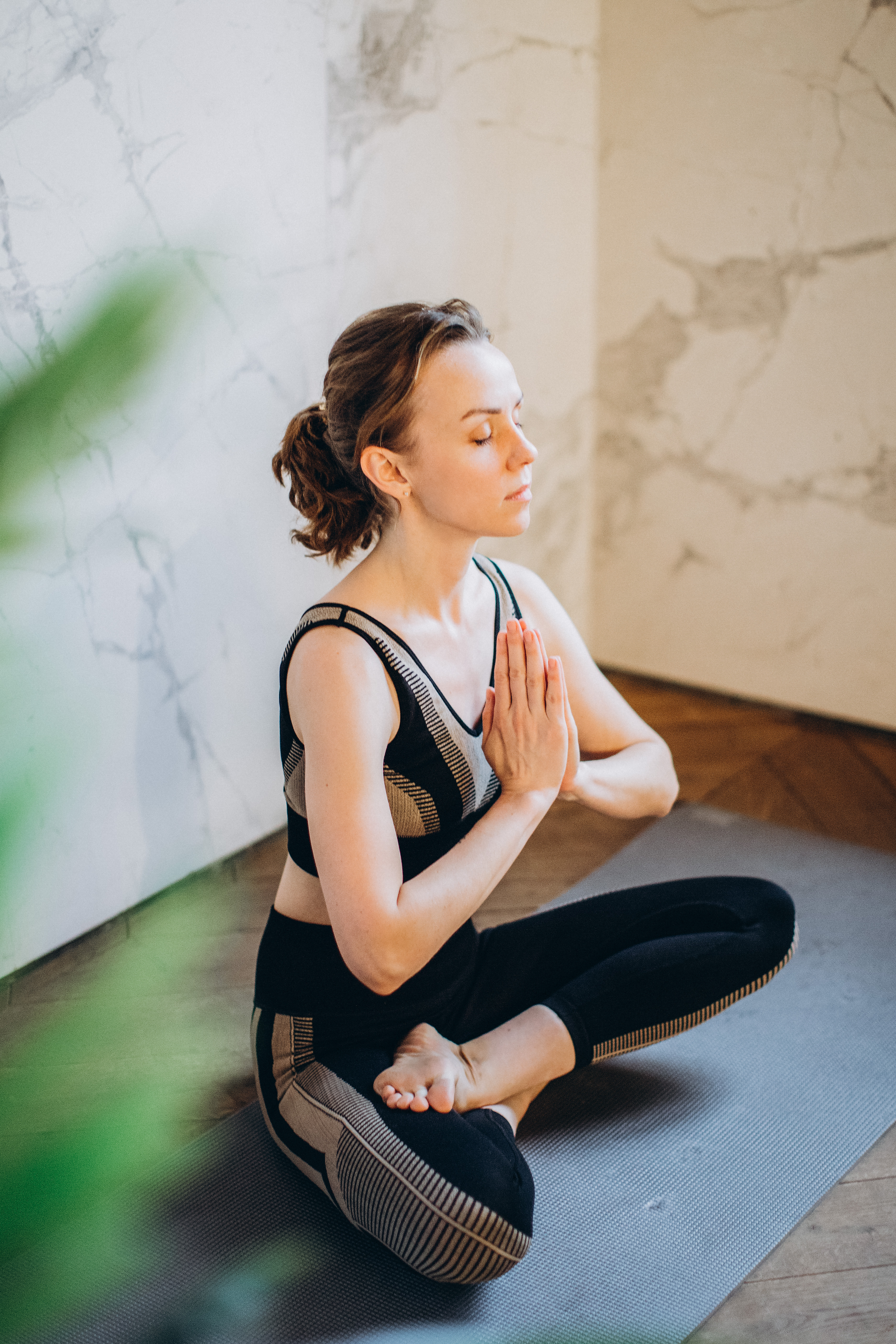 Canva - Woman in Lotus Pose