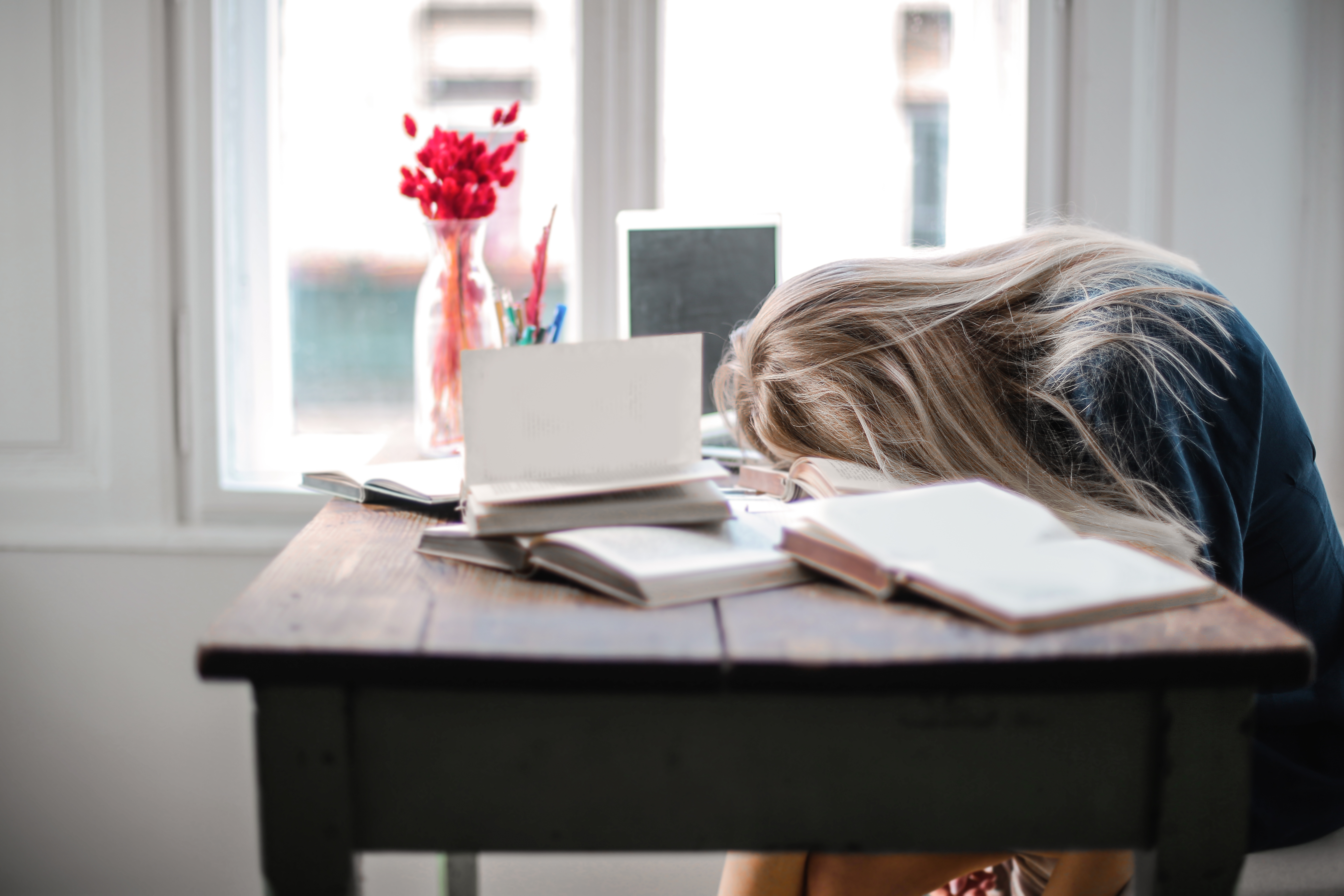 Canva - Woman Leaning on Table
