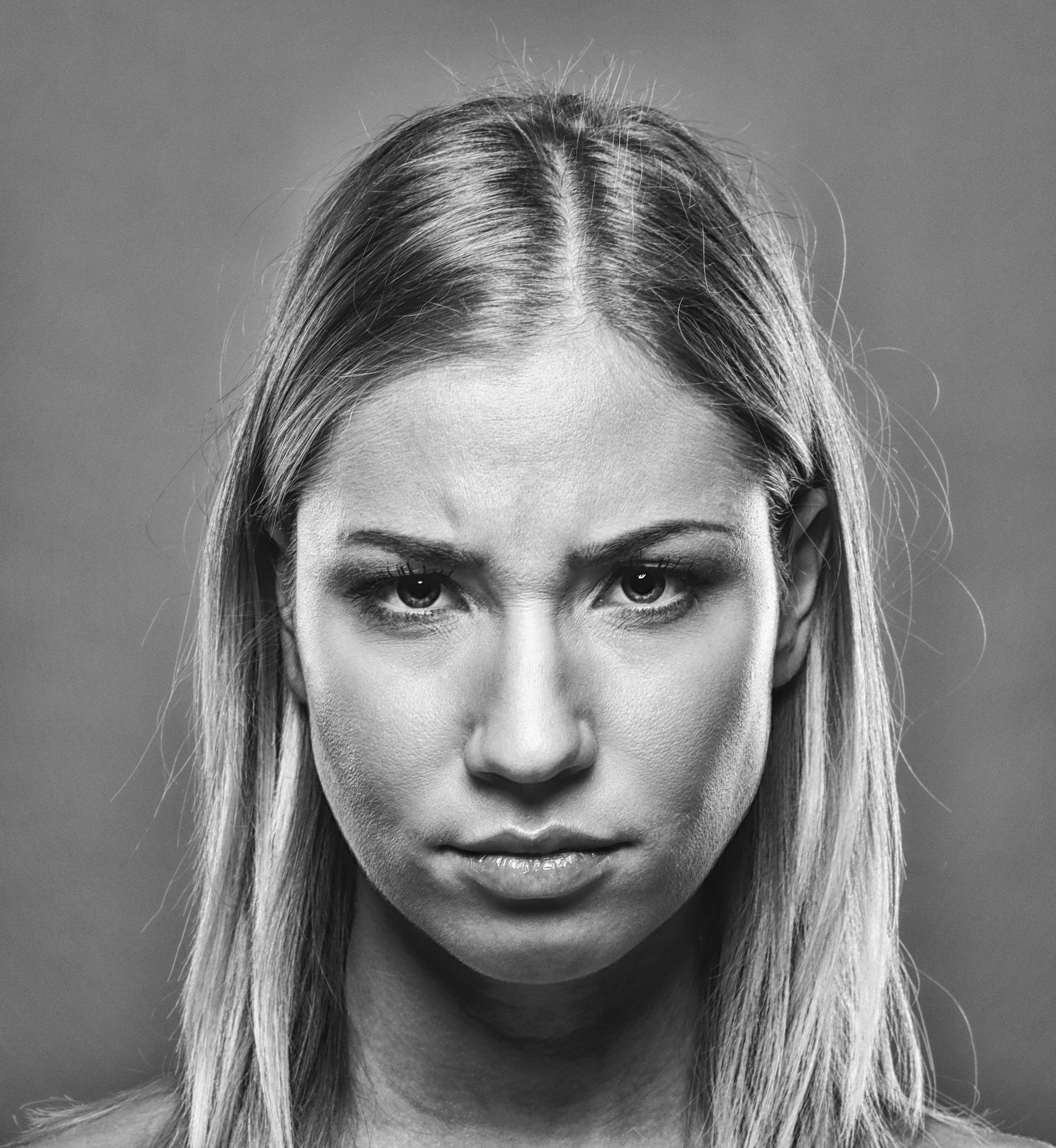 Canva - Portrait of an Angry Blonde Woman